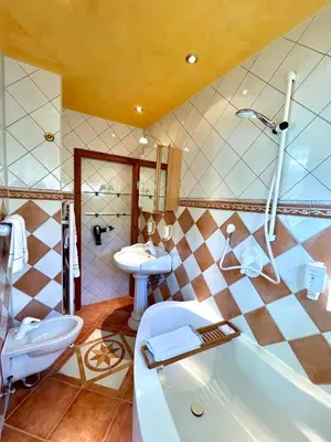 Ein Badezimmer in der Unterkunft Chalet am Kurpark