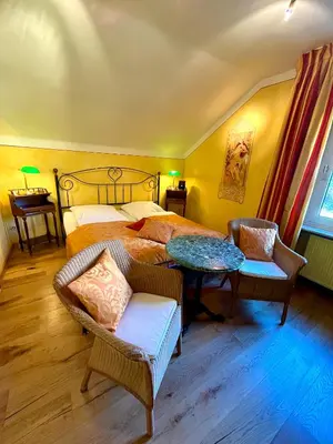 Ein Bett oder Betten in einem Zimmer der Unterkunft Chalet am Kurpark