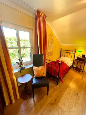 Ein Bett oder Betten in einem Zimmer der Unterkunft Chalet am Kurpark