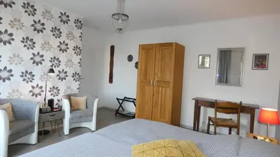 Ein Bett oder Betten in einem Zimmer der Unterkunft Gästehaus Hoxel