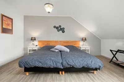 Ein Bett oder Betten in einem Zimmer der Unterkunft Gästehaus Hoxel