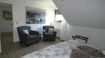 Ein Sitzbereich in der Unterkunft Gästehaus Hoxel