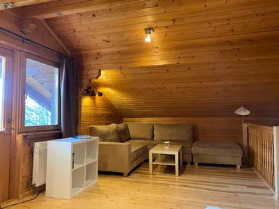 Ein Sitzbereich in der Unterkunft EIFELCOTTAGE Family 9