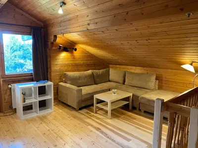 Ein Sitzbereich in der Unterkunft EIFELCOTTAGE Family 9