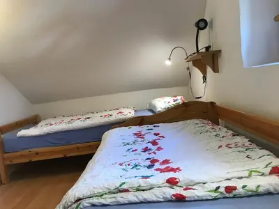Ein Bett oder Betten in einem Zimmer der Unterkunft Ferienhaus 
