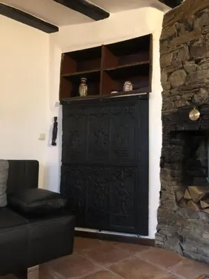 Ein Sitzbereich in der Unterkunft Hommes Haus