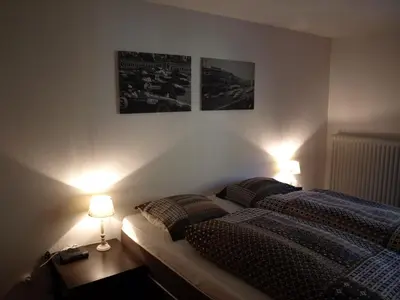 Ein Bett oder Betten in einem Zimmer der Unterkunft Bed&Breakfast Eifelpension Brückenschenke