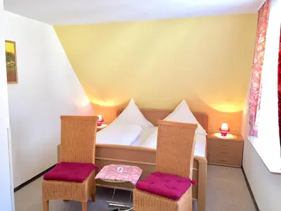 Ein Sitzbereich in der Unterkunft Hotel Weingut Schützen