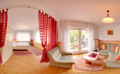 Ein Sitzbereich in der Unterkunft Hotel Weingut Schützen