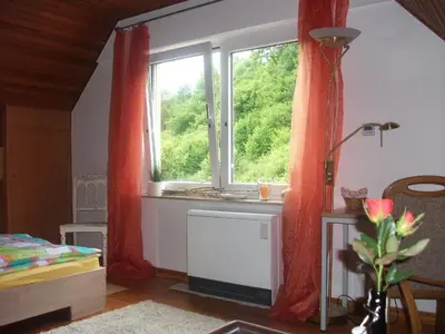 Ein Bett oder Betten in einem Zimmer der Unterkunft Urlaub am Auberg
