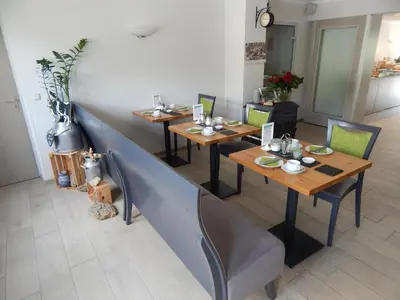 Ein Sitzbereich in der Unterkunft Hotel garni Am Brunnenplatz