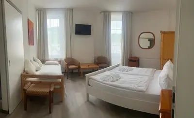 Ein Bett oder Betten in einem Zimmer der Unterkunft Hotel Ohm Patt