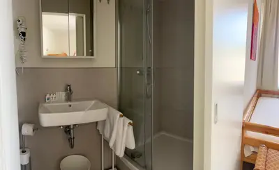 Ein Badezimmer in der Unterkunft Hotel Ohm Patt