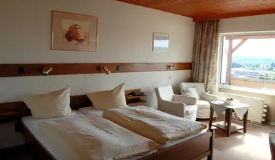 Ein Bett oder Betten in einem Zimmer der Unterkunft Landgasthaus Pfahl