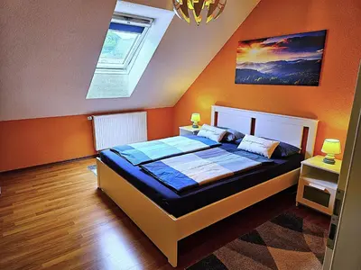 Ein Bett oder Betten in einem Zimmer der Unterkunft Cochem Ferienwohnung Scheuer