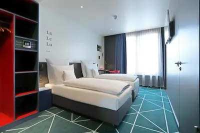 Ein Bett oder Betten in einem Zimmer der Unterkunft sander Hotel