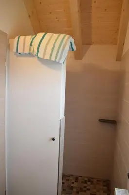 Ein Bett oder Betten in einem Zimmer der Unterkunft Beim Hooch 