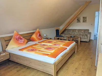 Ein Bett oder Betten in einem Zimmer der Unterkunft Gaestehaus Gaes