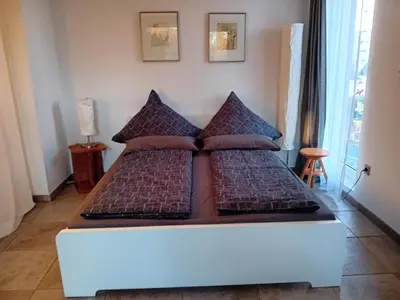 Ein Bett oder Betten in einem Zimmer der Unterkunft Domizil Koblenz