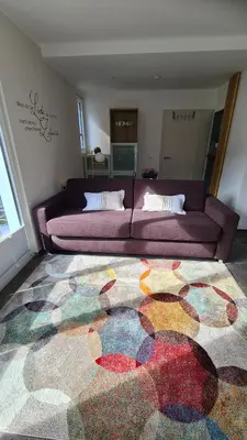 Ein Sitzbereich in der Unterkunft Ferienwohnung Wurzelecht