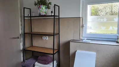 Ein Bett oder Betten in einem Zimmer der Unterkunft Ferienwohnung Wurzelecht