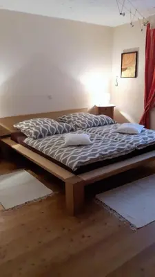 Ein Bett oder Betten in einem Zimmer der Unterkunft Ferienwohnung-malanders