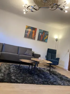 Ein Sitzbereich in der Unterkunft Vakantiewoning Duitsland