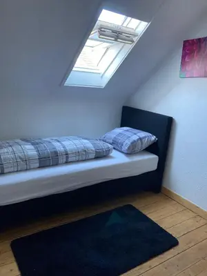Ein Bett oder Betten in einem Zimmer der Unterkunft Vakantiewoning Duitsland
