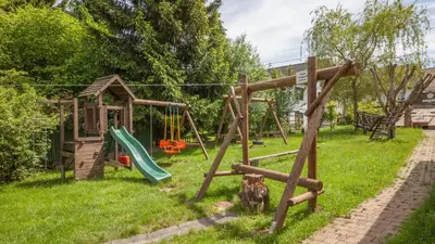 Ein Kinderspielbereich in der Unterkunft Hotel Am Eifelsteig