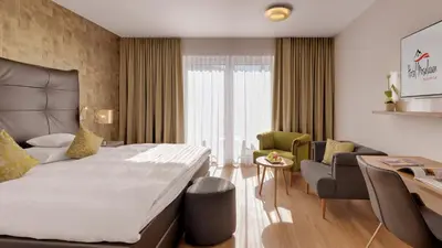 Ein Bett oder Betten in einem Zimmer der Unterkunft Hotel Moselauen