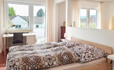 Ein Bett oder Betten in einem Zimmer der Unterkunft Apartment in musikalischem Haus