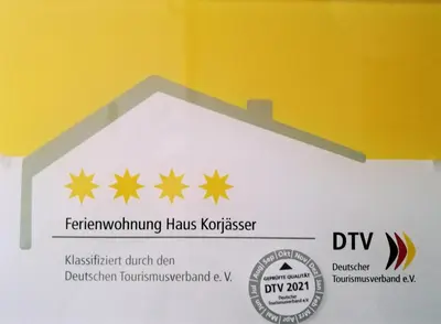 Ein Zertifikat, Auszeichnung, Logo oder anderes Dokument, das in der Unterkunft Haus Korjässer ausgestellt ist