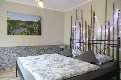 Ein Bett oder Betten in einem Zimmer der Unterkunft Villa Marlene