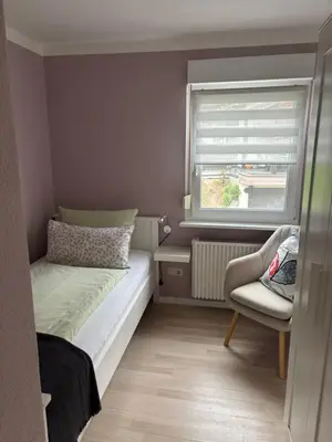Ein Bett oder Betten in einem Zimmer der Unterkunft 