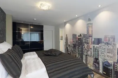Ein Bett oder Betten in einem Zimmer der Unterkunft Ferienwohnung Welcome mit Seeblick