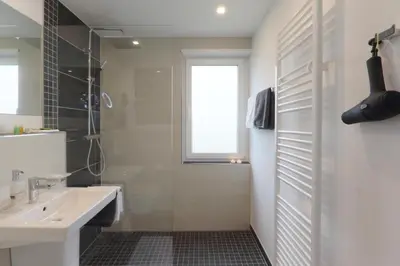 Ein Badezimmer in der Unterkunft Ferienwohnung Welcome mit Seeblick