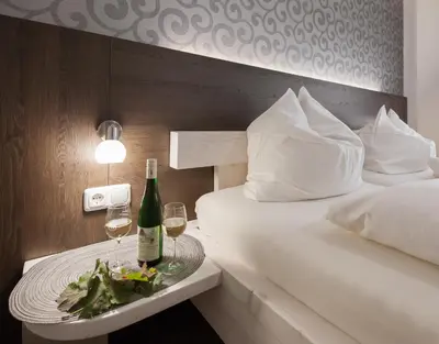 Ein Bett oder Betten in einem Zimmer der Unterkunft Gästehaus Wein im Turm