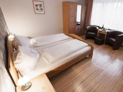 Ein Bett oder Betten in einem Zimmer der Unterkunft Gästehaus Wein im Turm