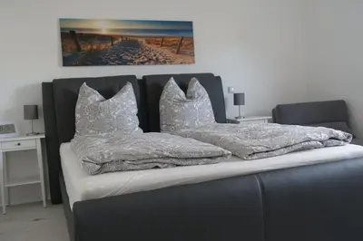 Ein Bett oder Betten in einem Zimmer der Unterkunft Niederwerth bei Koblenz