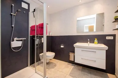 Ein Badezimmer in der Unterkunft Ferienwohnungen am Matthiasturm