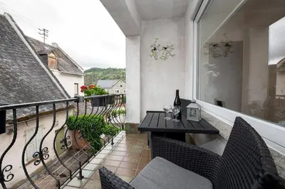 Ein Balkon oder eine Terrasse in der Unterkunft Ferienwohnungen am Matthiasturm