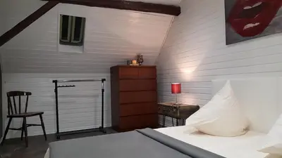 Ein Bett oder Betten in einem Zimmer der Unterkunft Ferienhaus Emil