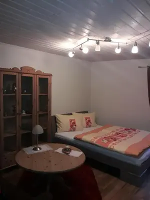 Ein Bett oder Betten in einem Zimmer der Unterkunft Gemütliche Zimmer