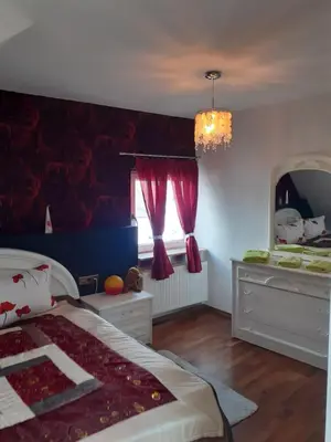 Ein Bett oder Betten in einem Zimmer der Unterkunft Gemütliche Zimmer