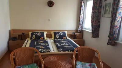 Ein Bett oder Betten in einem Zimmer der Unterkunft Ferienwohnungen Mentges