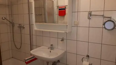Ein Badezimmer in der Unterkunft Ferienwohnungen Mentges