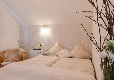 Ein Bett oder Betten in einem Zimmer der Unterkunft Am Quittenbaum