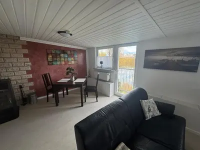 Ein Sitzbereich in der Unterkunft Ferienwohnung Römerbrücke