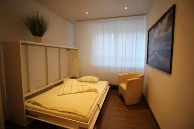 Ein Bett oder Betten in einem Zimmer der Unterkunft City Schloss Viktoria
