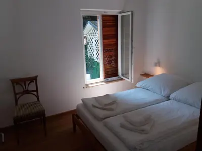 Ein Bett oder Betten in einem Zimmer der Unterkunft Ferienhaus Baederleiblick